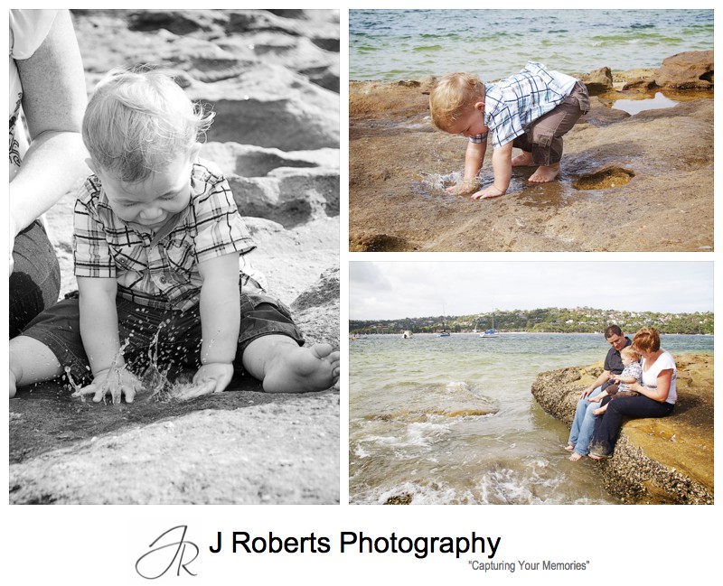Little boy playing in the rock pools at a Sydney beach - family portrait photography sydney